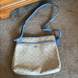 Tan and blue coach cross body bag